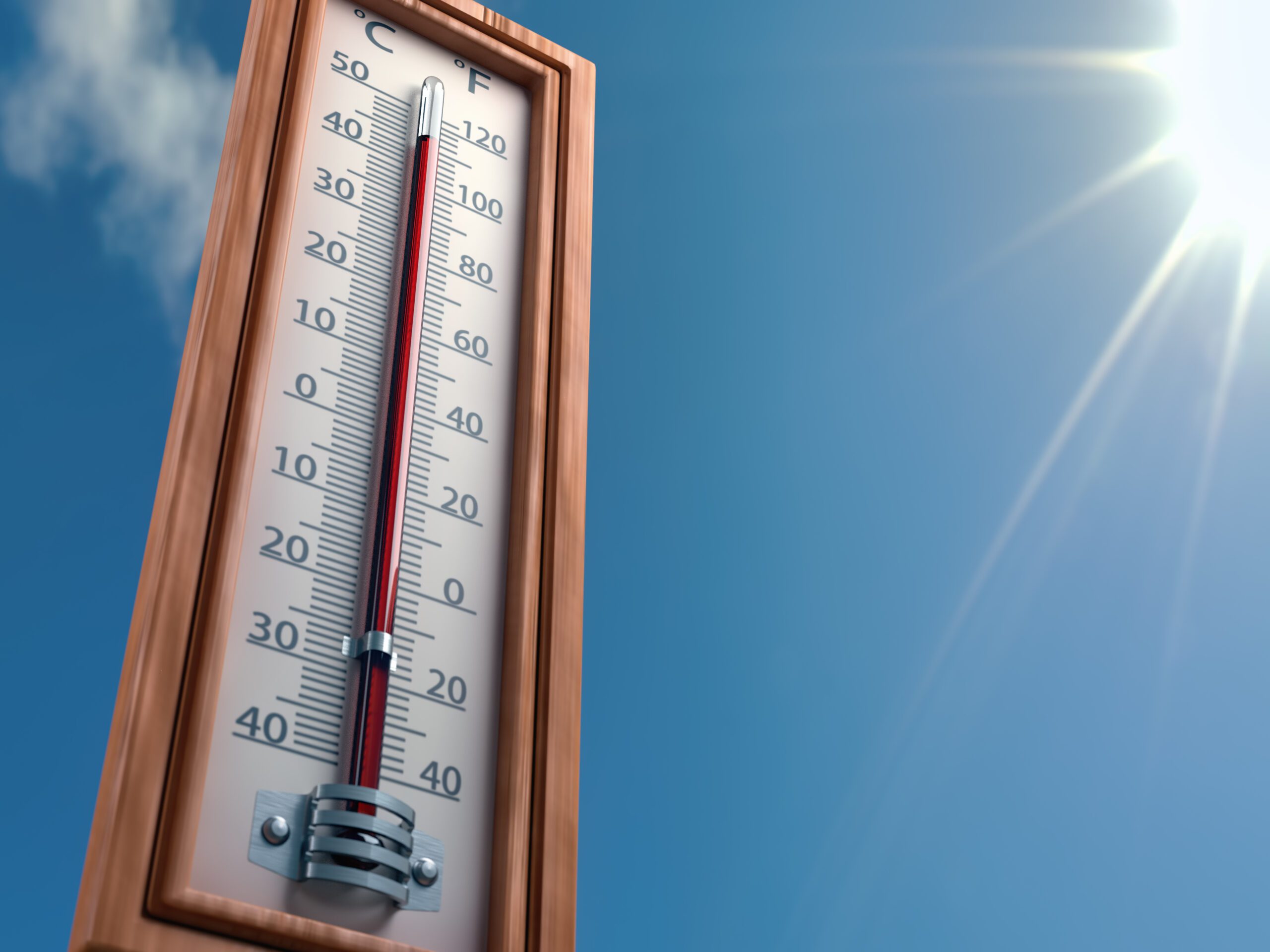 Thermometer in sun with high heat
